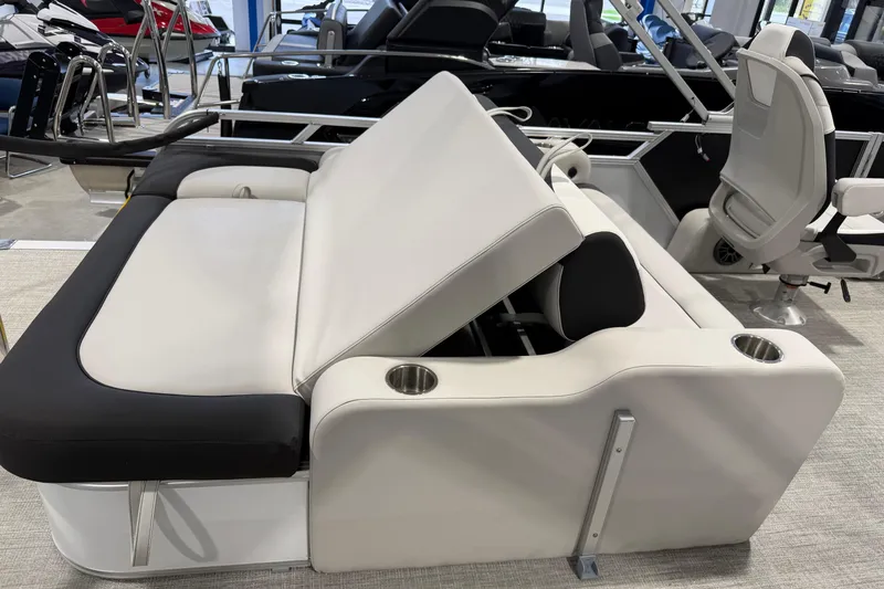 Slide: The Image of 2026 Avalon 2385 25 LSZ VRB boat interior with adjustable seating and cup holders. - 8