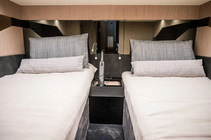 Slide: The Image of Twin beds in a luxurious Santasevera52 yacht cabin, 2026 model. - 16
