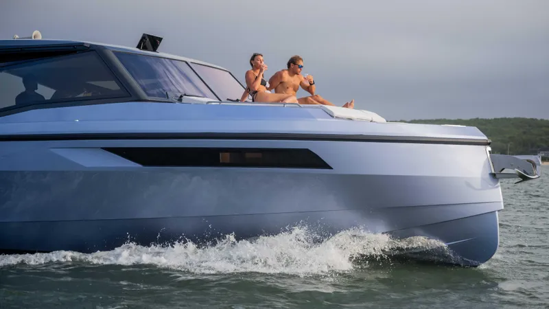 Slide: The Image of 2026 Santasevera Santasevera52 yacht cruising with two people relaxing on deck. - 2
