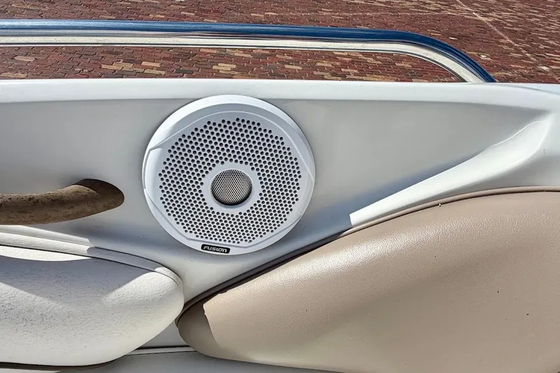 Slide: The Image of Speaker on 2005 Crownline 216 LS boat interior, featuring Fusion audio system. - 26