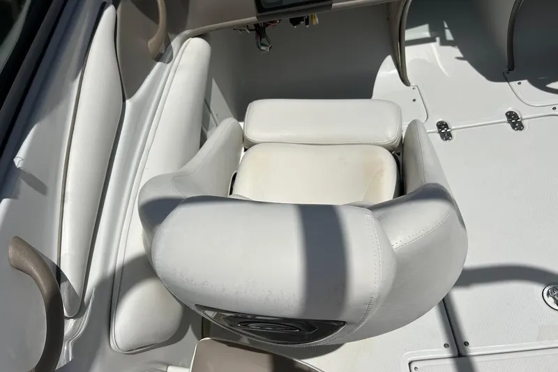 Slide: The Image of White seating area on a 2005 Crownline 216 LS boat. - 32