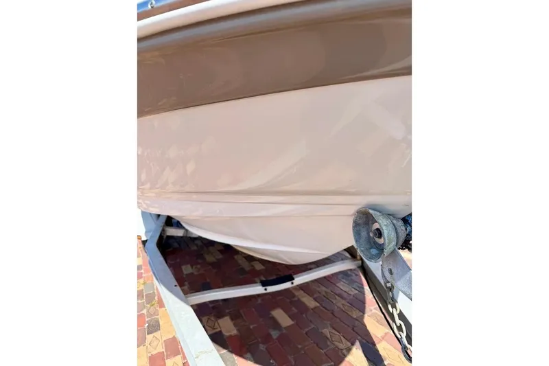 Slide: The Image of 2005 Crownline 216 LS boat hull on trailer, close-up view. - 7