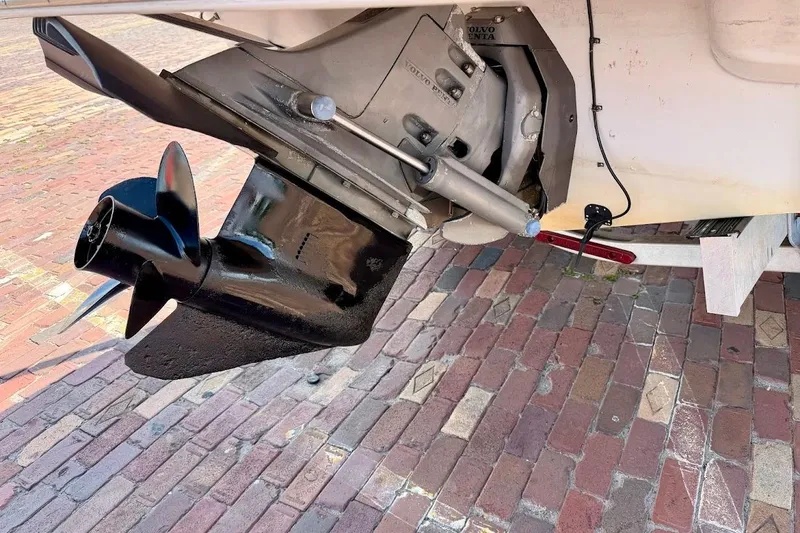 Slide: The Image of 2005 Crownline 216 LS boat propeller and stern drive on brick surface. - 9
