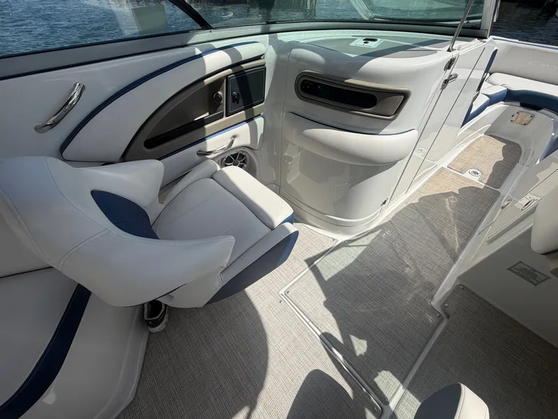 Slide: The Image of Interior of 2023 Crownline Eclipse E285 XS with luxurious seating. - 15
