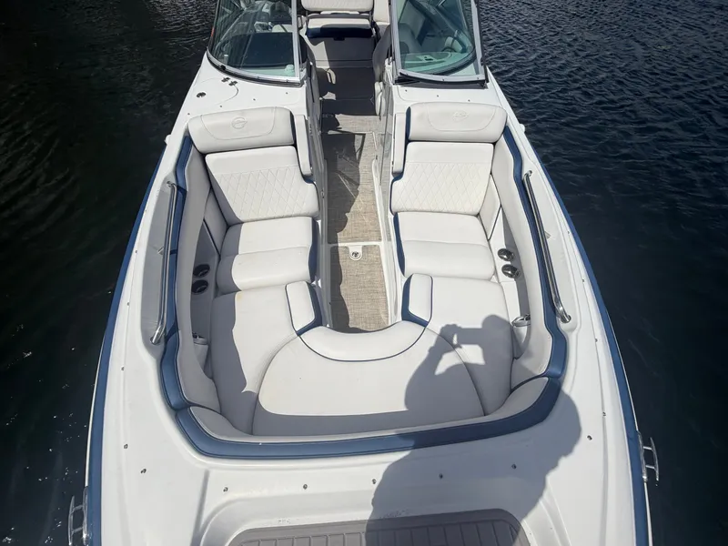 Slide: The Image of 2023 Crownline Eclipse E285 XS boat with luxurious interior seating. - 17