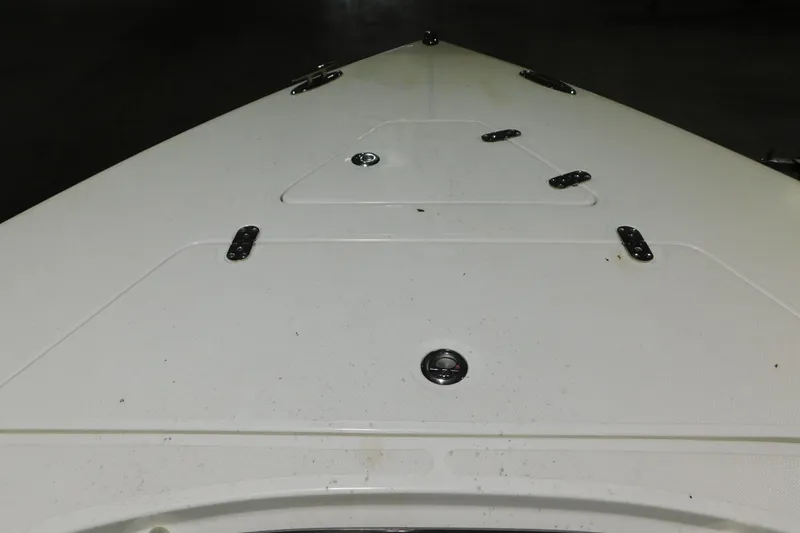 Slide: The Image of Bow view of a 2005 Fountain 34 Center Console boat, showcasing deck details. - 11