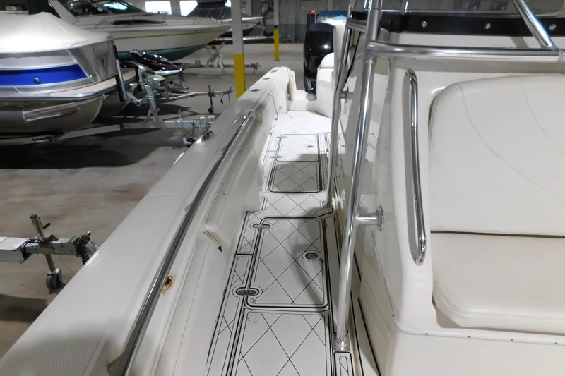 Slide: The Image of 2005 Fountain 34 Center Console boat interior with sleek design and spacious seating. - 15