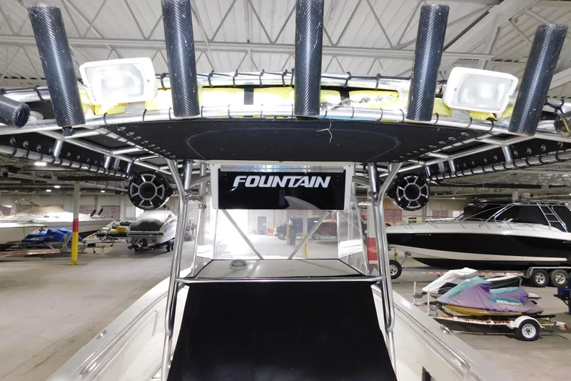 Slide: The Image of 2005 Fountain 34 Center Console boat in indoor storage facility. - 19