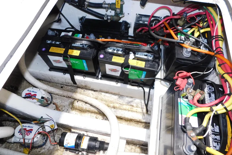 Slide: The Image of Electrical system of a 2005 Fountain 34 Center Console boat with batteries and wiring. - 32