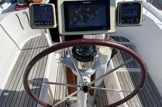 Slide: The Image of Steering wheel and navigation instruments on a 1997 Beneteau Oceanis 40 CC sailboat. - 6