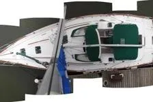 Slide: The Image of Beneteau Oceanis 40 CC yacht deck, featuring railing and equipment, 1997 model. - 8