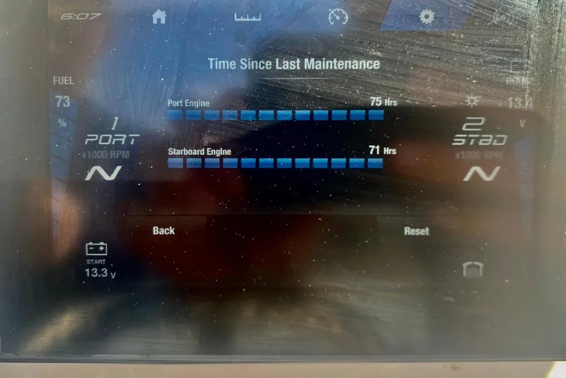 Slide: The Image of Display screen of 2024 Yamaha Boats 222 FSH Sport E showing engine maintenance hours. - 14
