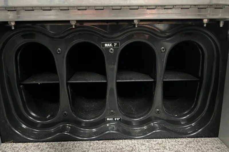 Slide: The Image of Storage compartment in a 2014 Alumacraft Competitor 165 Tiller boat, labeled with maximum dimensions. - 19