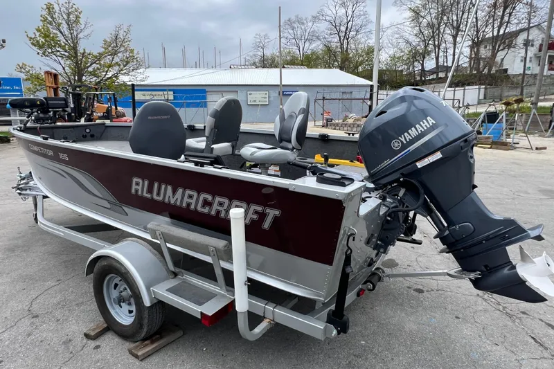Slide: The Image of 2014 Alumacraft Competitor 165 Tiller boat with Yamaha motor on trailer. - 7
