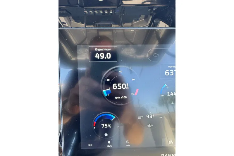 Slide: The Image of Dashboard display of 2024 Scout 281 XSS showing 49 engine hours and 650 RPM. - 17