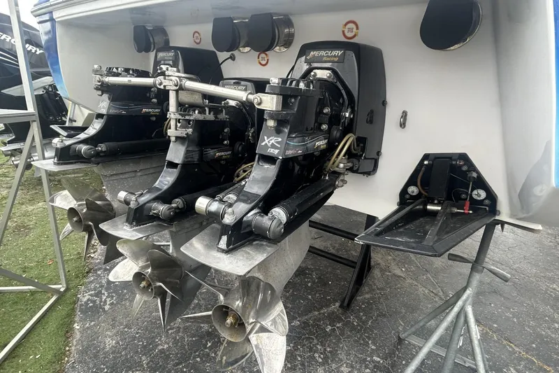 Slide: The Image of 2006 Donzi 43 ZR boat with Mercury Racing engines and propellers, rear view. - 11
