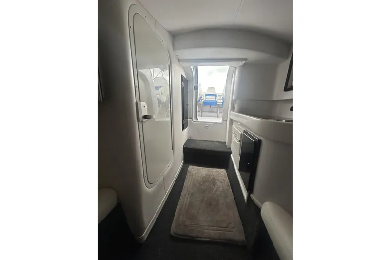 Slide: The Image of Interior view of 2006 Donzi 43 ZR boat, featuring sleek design and modern amenities. - 15