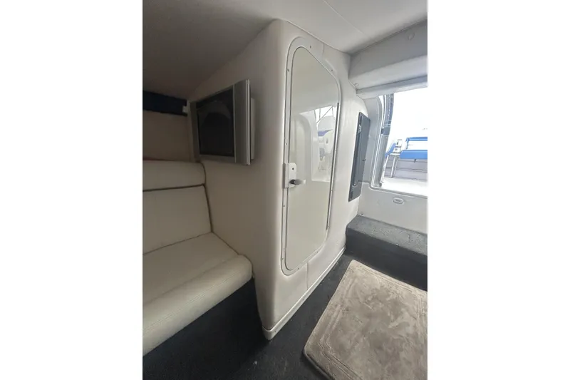 Slide: The Image of Interior of a 2006 Donzi 43 ZR boat, featuring a sleek cabin design. - 24