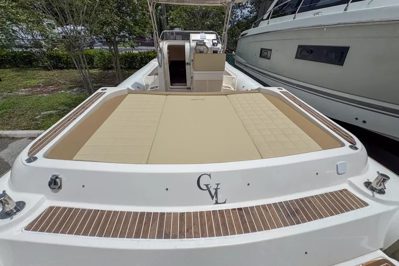 Slide: The Image of 2023 Tender Impertus 36 boat with spacious deck and luxurious seating. - 17