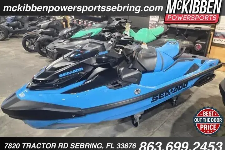 The Image of 2026 Sea-Doo RXT-X 325 jet ski in blue, displayed at McKibben Powersports Sebring. - 1