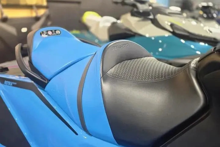 Slide: The Image of 2026 Sea-Doo RXT-X 325 jet ski seat in blue and black design. - 14