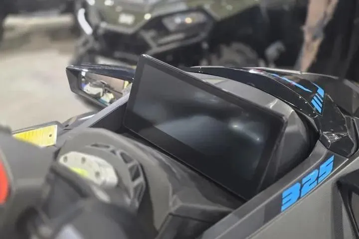 Slide: The Image of 2026 Sea-Doo RXT-X 325 dashboard with digital display and controls. - 17