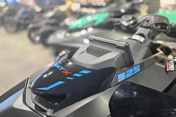 Slide: The Image of 2026 Sea-Doo RXT-X 325 jet ski, close-up of dashboard and handlebars. - 4