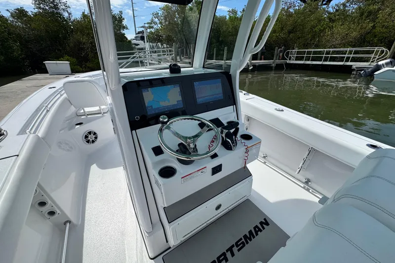 Slide: The Image of 2024 Sportsman Open 262 Center Console boat with advanced navigation system and sleek design. - 17