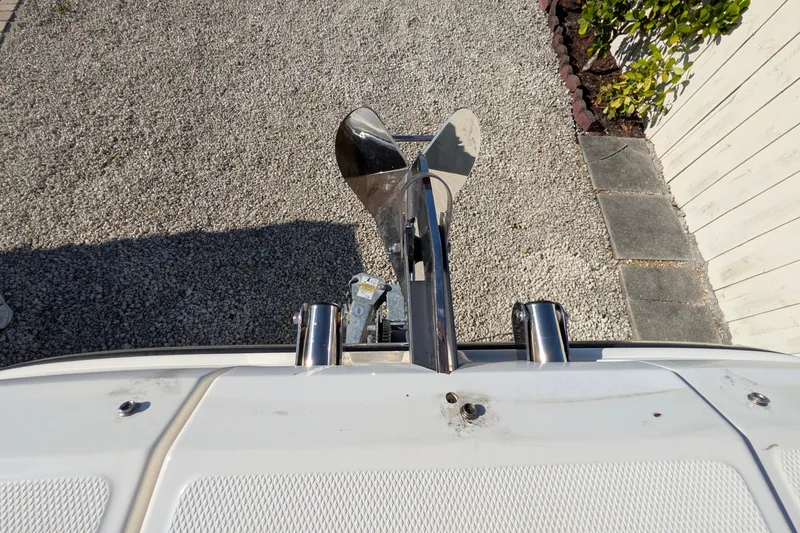 Slide: The Image of Bayliner DX 2000 boat anchor detail, 2022 model, on gravel surface. - 14