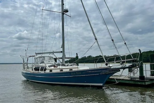 The Image of 2016 Gozzard 41 RC sailboat docked on a cloudy day. - 0