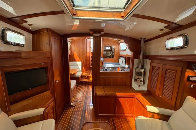 Slide: The Image of Luxurious interior of a 2016 Gozzard 41 RC yacht with elegant wood finishes. - 10