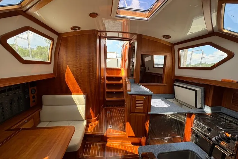 Slide: The Image of Luxurious interior of 2016 Gozzard 41 RC yacht with wood finish and modern amenities. - 14