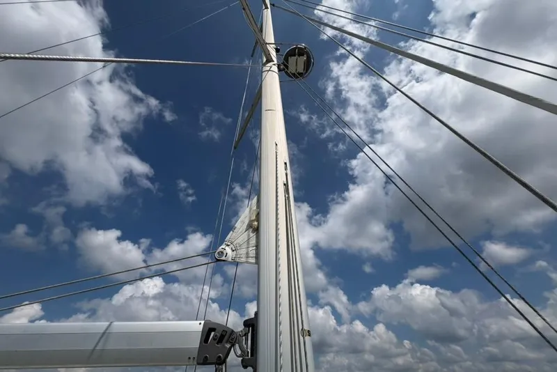 Slide: The Image of Sailboat mast of 2016 Gozzard 41 RC against a cloudy sky. - 47