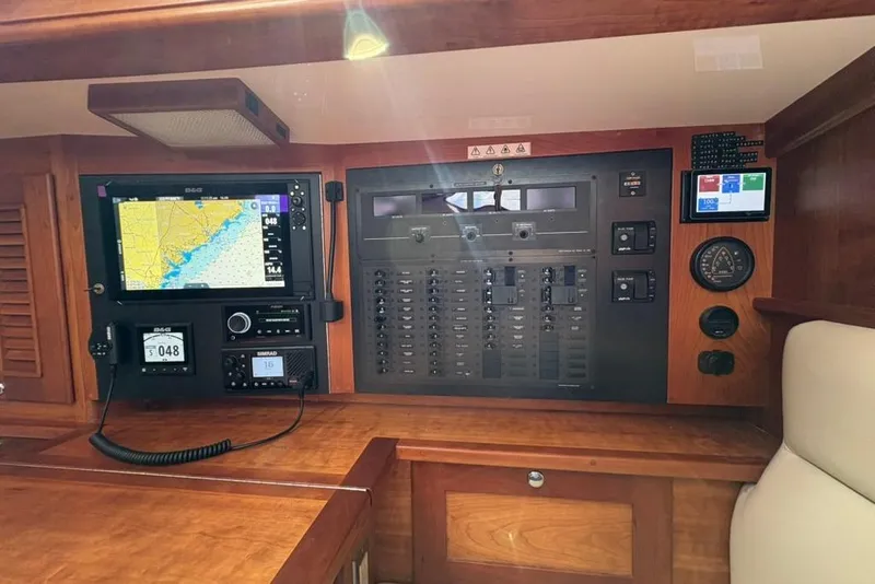 Slide: The Image of Control panel of a 2016 Gozzard 41 RC yacht with navigation equipment. - 18