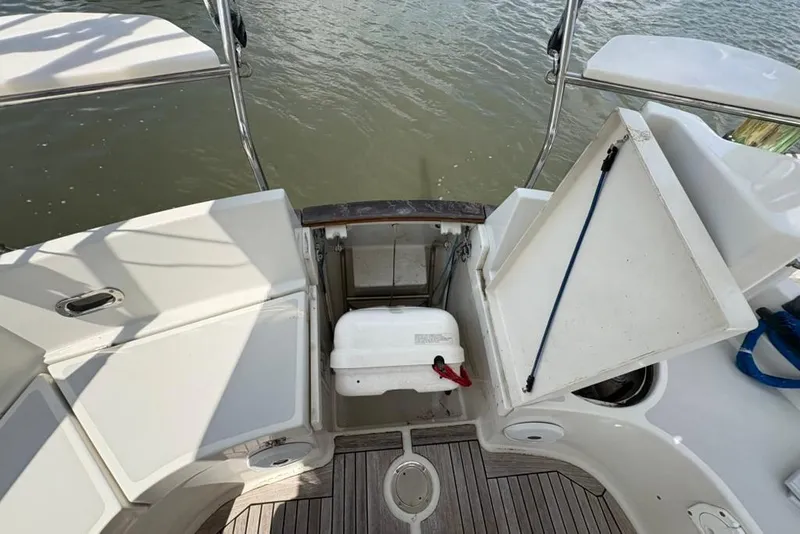 Slide: The Image of 2016 Gozzard 41 RC yacht deck with open storage compartment and water view. - 36