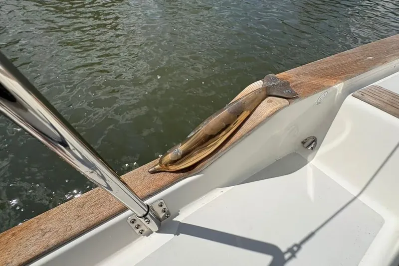 Slide: The Image of Gozzard 41 RC sailboat deck detail with wooden and metal fittings, 2016 model. - 48