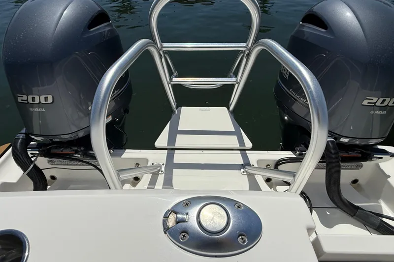 Slide: The Image of 2021 World Cat 280 DC-X boat with dual Yamaha 200 engines, rear view. - 17