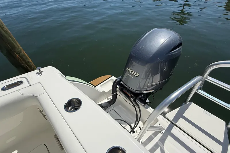 Slide: The Image of 2021 World Cat 280 DC-X boat with Yamaha 200 outboard motor on calm water. - 20