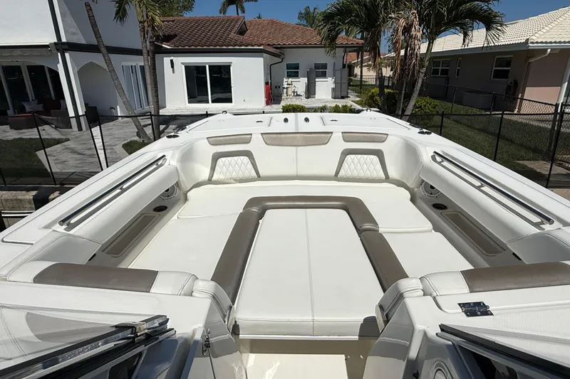 Slide: The Image of 2021 World Cat 280 DC-X boat interior with spacious seating and modern design. - 5