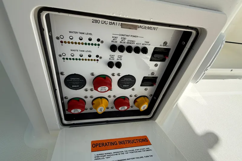 Slide: The Image of Control panel of a 2021 World Cat 280 DC-X boat, showing battery management and operating instructions. - 8