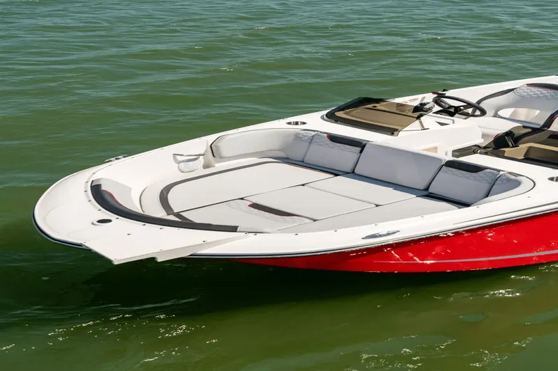 Slide: The Image of 2024 Bayliner M19 boat on calm water. - 5