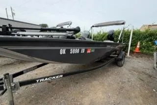 The Image of 2018 Tracker Pro 170 boat on trailer, parked outdoors, side view. - 1