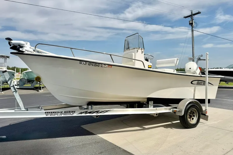 Slide: The Image of 2014 May-Craft 1800 Skiff boat on trailer at Greenville Marine dealership. - 5