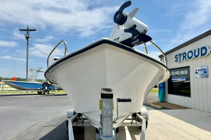 Slide: The Image of 2014 May-Craft 1800 Skiff boat on trailer outside Stroud dealership. - 8