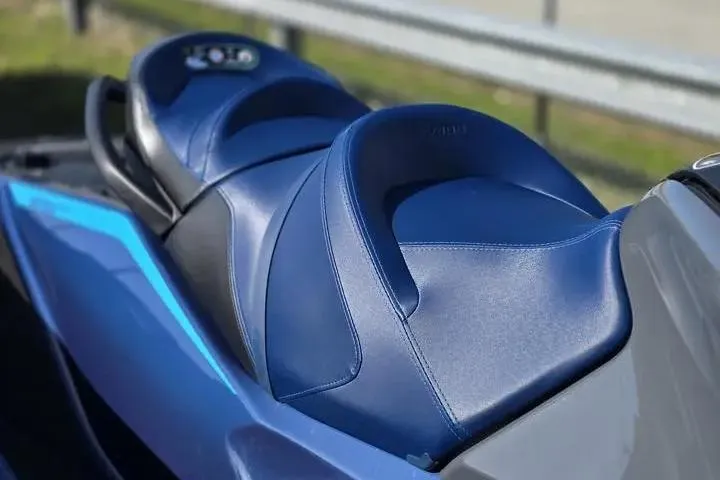 Slide: The Image of 2026 Sea-Doo GTX 230 jet ski with blue seating, close-up view. - 10