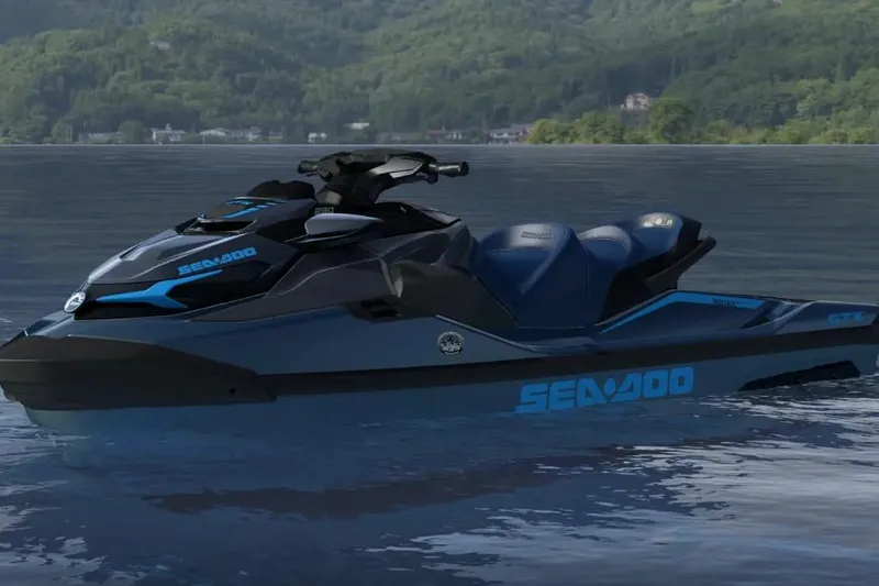 Slide: The Image of 2026 Sea-Doo GTX 230 jet ski on a serene lake with lush green hills. - 16