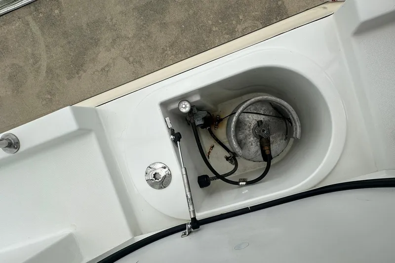 Slide: The Image of Beneteau Swift Trawler 34 Fly 2011 deck with storage compartment and equipment. - 13