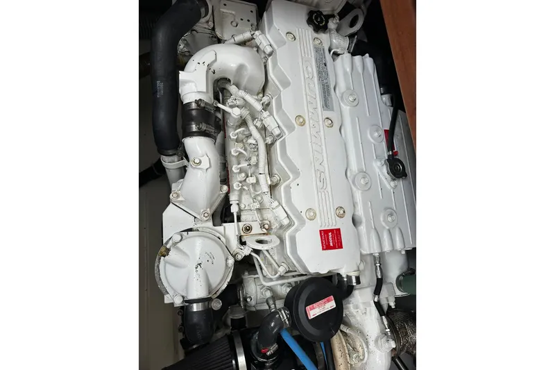 Slide: The Image of Engine of a 2011 Beneteau Swift Trawler 34 Fly, showcasing detailed components. - 68