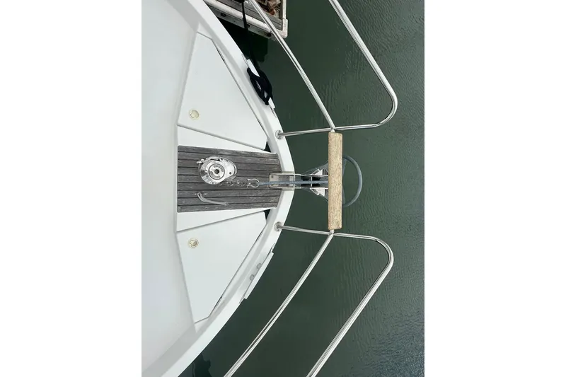 Slide: The Image of Bow view of 2011 Beneteau Swift Trawler 34 Fly, featuring deck and railing. - 7