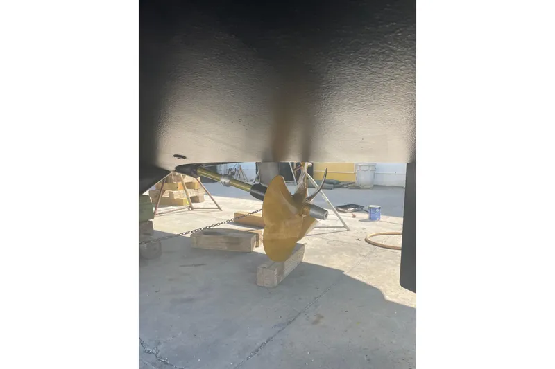 Slide: The Image of Underwater view of 2011 Beneteau Swift Trawler 34 Fly propeller and hull. - 73